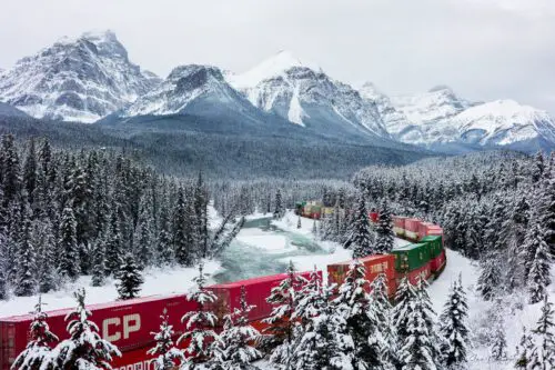 Canadian Pacific Railway train print, Banff National Park train photography, Snowy mountain train art, Fine art train print for sale, Canadian wilderness train photo, Winter train landscape artwork, Mountain scenery train print, Banff train wall decor, Train artwork with snowy mountains, Snow-covered railway print, Train collector's print, Winter wonderland train photo, Scenic train journey artwork, Mountainous train landscape print, Canadian railway wall art, photography wall art, train art, alberta landscape photography, canadian landscape photography, Canadian landscape photographer